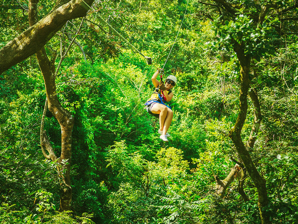Image of a woman Zip Lining